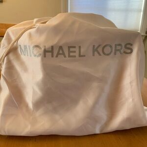Pink Michael Kors shoulder bag.